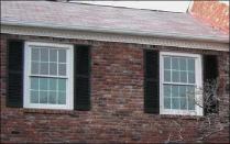 The key to a flawless window replacement in a brick-veneer wall is sizing the new window properly. The replacement unit must be small enough to fit through the existing brick opening without having to dismantle the brick and mortar, but large enough to minimize the unsupported flashing and allow the new unit to be inconspicuously trimmed out.