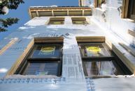 Adding rigid foam to the outside of the shell dramatically increases R-value while reducing thermal conduction.