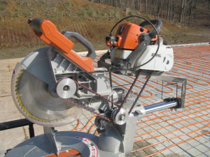 Ridgid miter saw jointed to a Stihl chainsaw.