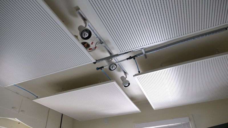 These are architectural panels that could be free standing on a ceiling or wall.  These panels are more suited to a commercial installation. In a residence, special drywall panels can also be used to mimic a conventional drywall ceiling.  In both cases, tubes are pre-built into the backside to distribute chilled water over the ceiling area.