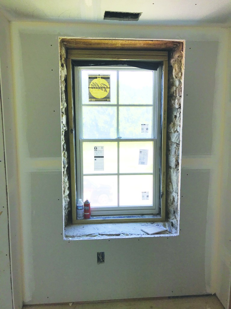 The rubble stone farmhouse walls were 18 inches thick. New windows were installed, set flush to the outside of the walls.