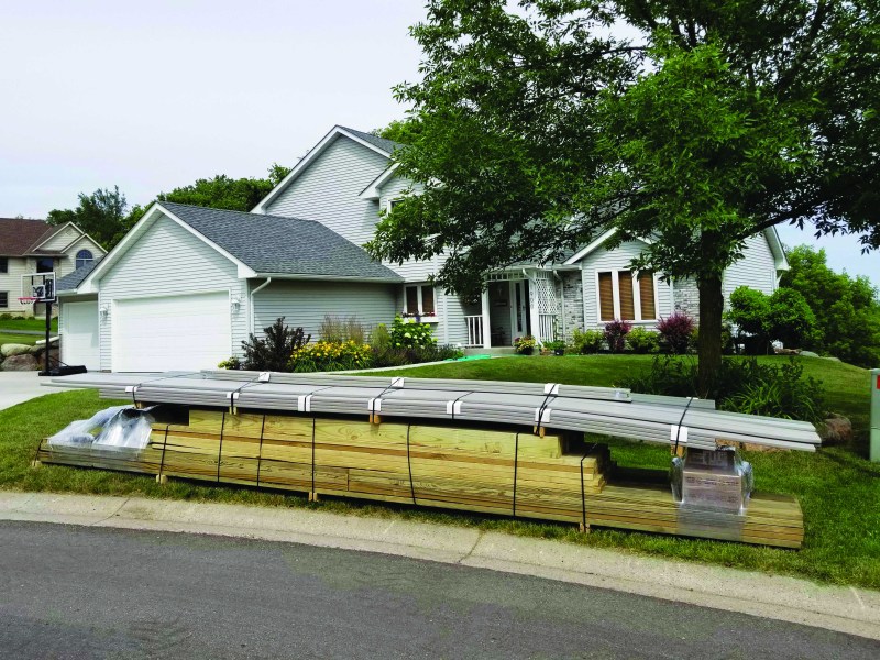Produced off site, this deck package is ready for assembly. The same production techniques used to prefabricate the parts can be adapted to custom deck construction.