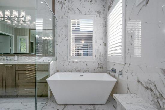 House plan with wet room, main bathroom. See more photos at Houseplans.
