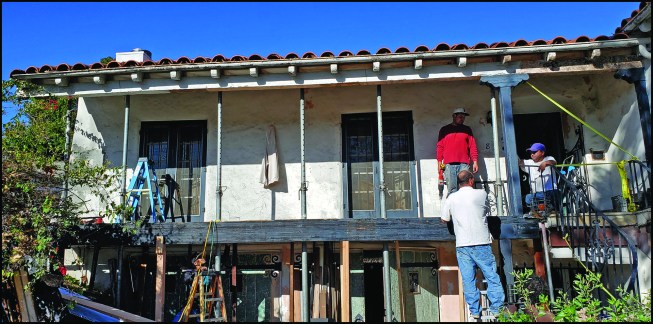 The author’s crew begins removing a rotted beam on a historical, circa-1929 California bungalow.