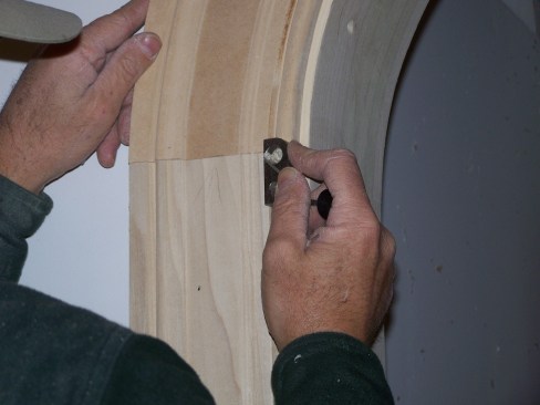 For areas that are too much to sand, a sharp 1/4-inch chisel or a mini plane like this one work well on the straight side jambs.