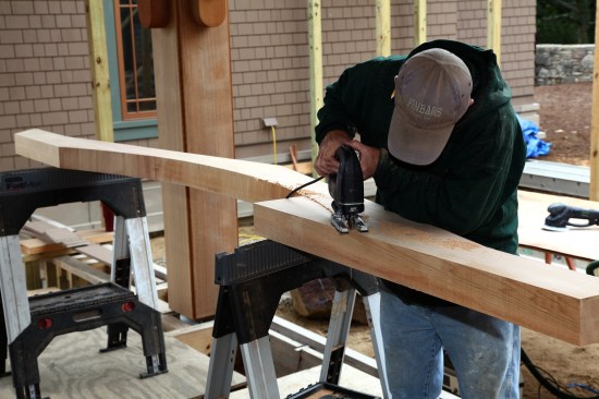 A jigsaw finishes the circular saw cut and then rough-cuts the arch.
