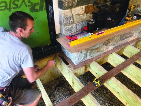They also mark lines down the middle of each joist for nail alignment.