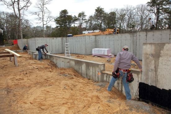 We repeated this process at the other end of the wall, which gave us two accurate points for snapping a second baseline along the dropped wall. We used this line to pull parallels for the other rear walls at that same foundation height.