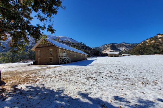 Gable-end view of re-constructed Barracks as viewed from north. Winter temperatures can dip to freezing, with the possibility of snow. Grapevine Canyon is known for occasional strong winds.
