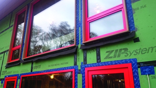 Strips of building paper that will be integrated with the building-paper drainage plane provide additional protection for thewindow sills.