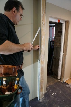 To make the head of the assembly level, first measure up on one side a given distance; in this case, 60 inches.