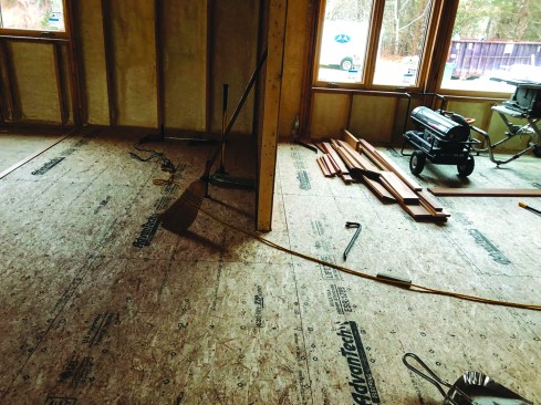 While there were no full partitions, the crew did have to fit around a couple of interior shear walls.