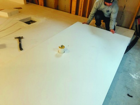 The insulation had to be cut out around all plumbing stub-ups through the slab.
