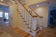 Matching molding profiles complete the finished newels.