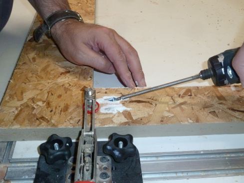 A cordless drill with clutch settings is the best tool for driving the screws.