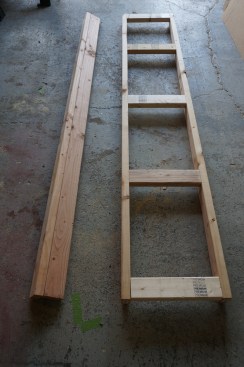 The other abnormal framing in a basic stud wall is a ladder back (right) for attaching an intersecting wall. The "rungs" of the ladder are scraps of 2x stock cut to 14 1/2 inches to fit between the studs in the normal layout.