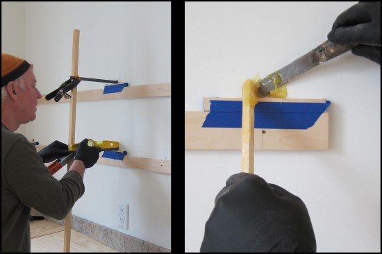 Vertical support sticks (pinned at the base with brads to keep them from wandering) and spring clamps were used to hold the steel rodsin place while the epoxy set up. Each dowel was leveled, its location scribed on the support sticks (photo, left). Once all support rod locations were dry-fit and triple-checked for level and true point-to-point sight lines, the epoxy was installed. A skinny putty knife and stick was used to fill the hole with epoxy (photo, right).