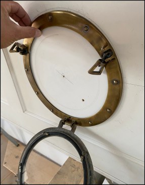 With the center of the door panel located, the porthole’s inner opening and outer flange were marked. The focal point was verified and marked.