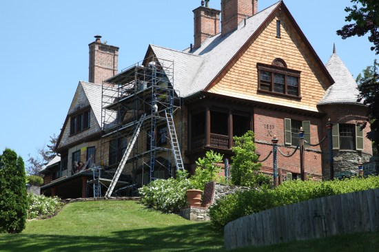 Elaborate staging allows the crew to reach the gable peaks.