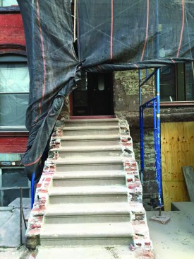 Some stairs were designed with closed stringers composed of a brickand brownstone mixture.