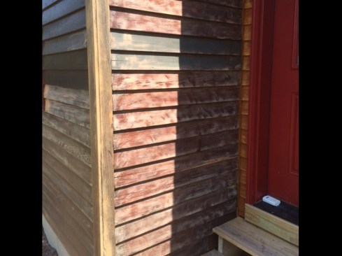 The pitting was random in its intensity and location. For instance, this small return wall adjacent to the front fa&ccedil;ade needed only to be scuff-sanded.