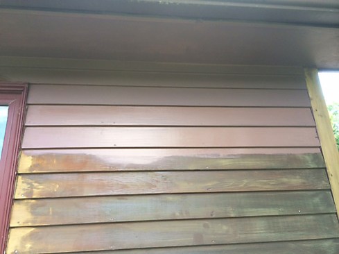 Our clients wanted to maintain a dark brown exterior, but didn’t want a transparent stain. We suggested using a deep-base acrylic primer, which we could tint to match the finish coat. The tinted primer afforded a degree of coverage, allowing us to apply just one finish coat.&nbsp;Working from the top down, we applied&nbsp;Sherwin Williams Multi-Purpose Latex Primer/Sealer primer, a high-adhesion primer that helps hide surface imperfections. We brushed it on, rather than spraying; the brush mechanically forces the primer into the grain for better adhesion.