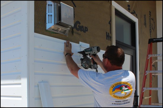 Dutch-lap siding was face-nailed with 8d SS ring-shank nails, the heads flush with siding and placed within 2" of the edge of each board.