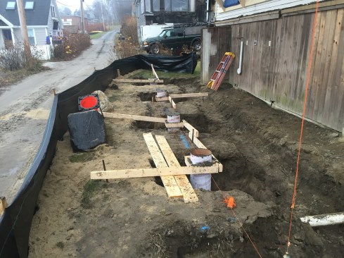 On the side of the house closest to the ocean, the crew set new foundation piers to support an open post system for the building's porch and roof.