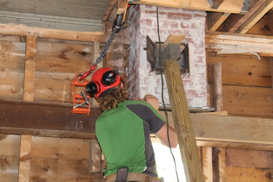 A steel plate was inserted during removal of the chimney support beam; a tube steel support was added later.