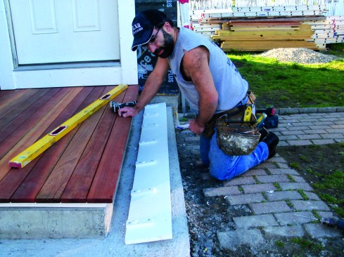 I stepped the trim out from the concrete using 1/2-inch spacers.