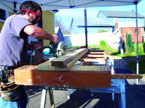 To cut the tapers, I made a simple jig by screwing one 2x4 to a second 2x4 at the angle of the taper.