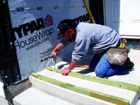... and drove in the fasteners to secure the sleepers in place.