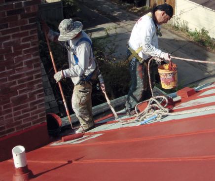 The finish coat then was applied to the field of the roof panels.