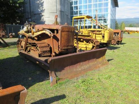 This is old but I can’t tell when it is from – maybe the 1930s or 40s. At some point the owner bolted a perforated steel plate over the radiator to protect it from damage. Many of the machines at the museum were similarly equipped, which suggests how hard logging could be on equipment.