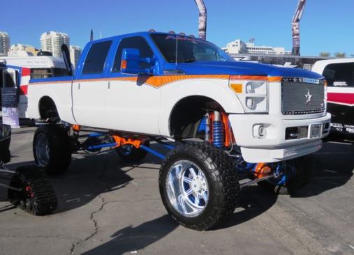 The second kind of truck at SEMA is extremely high off the ground…