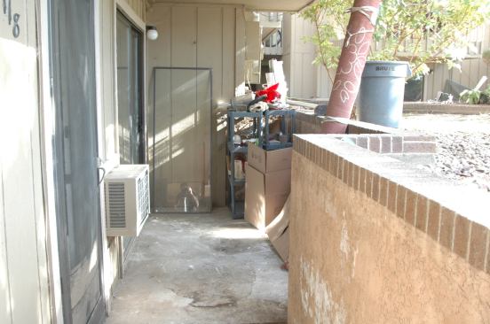 The floor drain outside the unit may work for melting snow and blowing rain on the front walk.