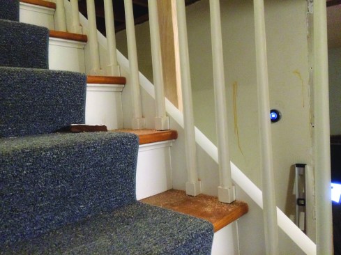 The photo shows the modified skirt board attached to the stairs. The framing for the bathroom wall would attach to the  horizontal cap on the skirt.