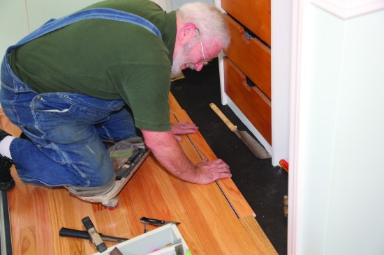 Cutting the tongue end of the board helps it slip into place easily between the jamb pieces.