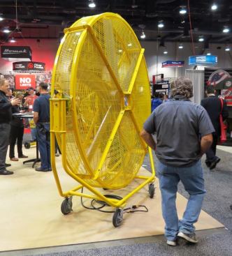 At 8’ in diameter this 
Big Ass fan (it’s a brand) is one big ass fan. Designed to move a high volume of air at low speed, this AirGo model is the largest of three industrial mobile fans made by the company. Also available are wall and column mounted fans plus ceiling fans up to 24’ in diameter. I’ve seen their big ceiling fans in more than one tool factory; the blades are so long they put winglets (like you’d see on airplane wings) on the ends.