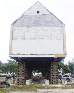 The jacks were able to lift the 3,000-square-foot structure more than 10 feet with less than 3/8-inch difference in elevation between any of the 10 lifting points.