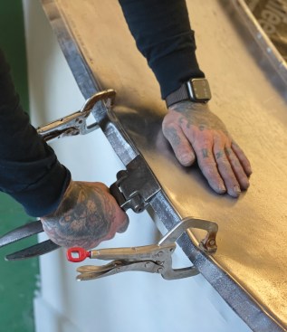 A lock seam joins one edge of the pan to the drip edge.