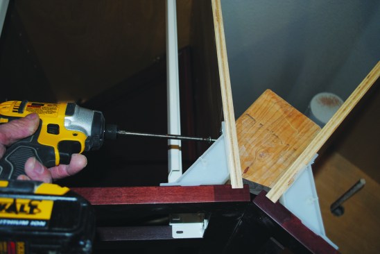 Angled blocks join neighboring cabinets.