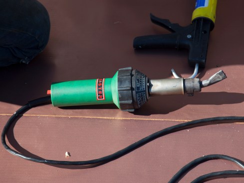 To weld the seams, the author’s crew uses a Leister hand-held, 1,500W torch, with power adjustable from 80W to 1,500W, and a temperature scope from 100°F to about 1,300°F. While cold weather doesn’t delay installation (you can even weld PVC in the rain), you do have to adjust the welding temperature upward to compensate. Likewise, in hot weather, you need to lower the welding temperature accordingly.