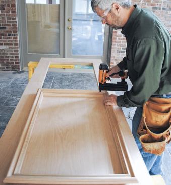 The author pins the panel molding to the jambs.