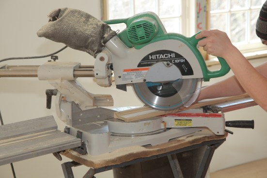 Set the miter saw to 45 degrees and cut the casing to length.