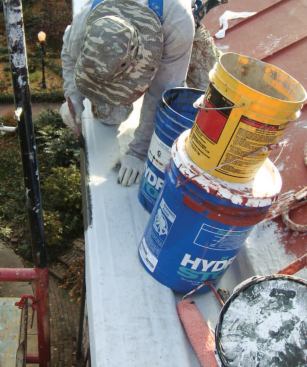 The existing EPDM-lined gutter was integrated into the new roof surface.