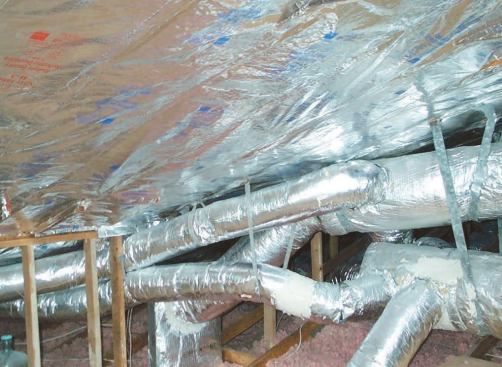 Rafters after applicaiton of radiant barrier foil.