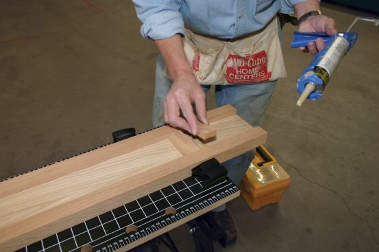 To make the panels, oak cross rails are glued on the front.