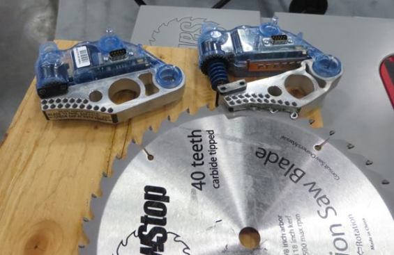 SawStop Cartridge. This is a shot of the cartridge for SawStop’s table saw safety system. The one on the left is new; the one on the right has been slammed against a spinning blade to prevent it from cutting “forbidden” material, such as hot dogs (or fingers). Note the extended spring and the deformed metal of the cartridge that has been activated. For more on this system see 
SawStop Jobsite Table Saw.