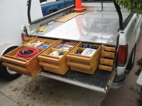 The large center boxes are as long as the bed.
